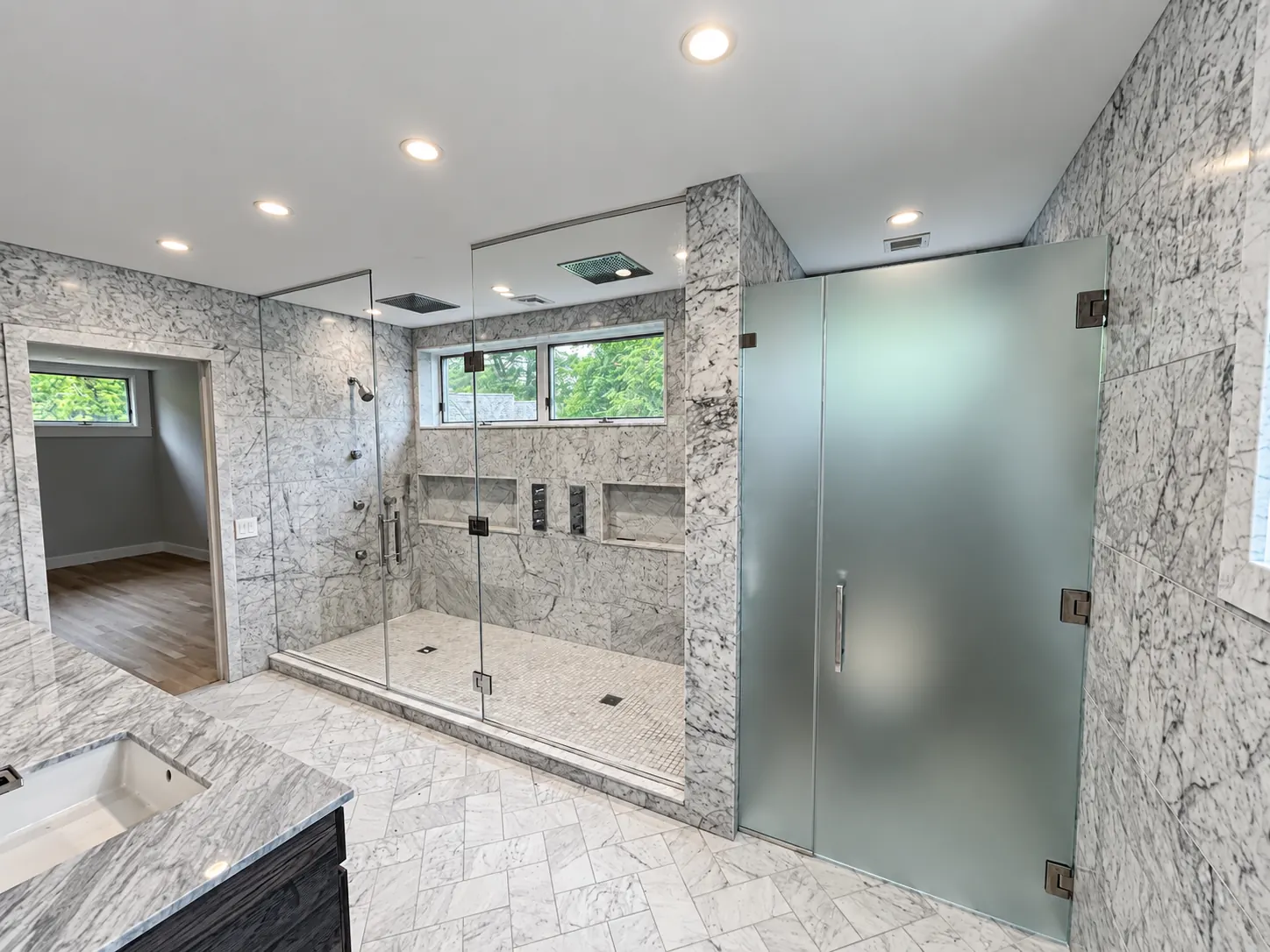 Walk-In Shower Glass and a Frosted Glass Door